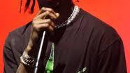 Travis Scott Donates Hangout Fest Merch Sales TO Planned Parenthood - HipHopBling